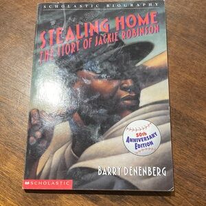 Scholastic Stealing Home — Red and Blue Cover